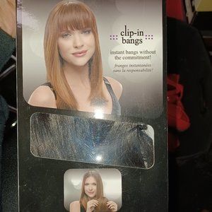 Brown clip in bangs